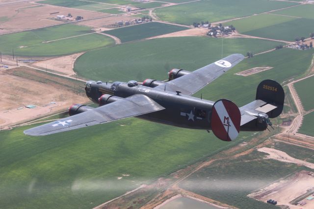 NX224J — - B-24J "Witchcraft" enroute from KFNL to KEAR on the morning of July 17, 2017.  Photo taken from the nose of B-25J "Tondelayo".  Photo by Pam Sheeler.