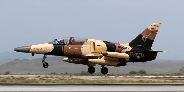 Aero L-159 (N275EM) - Draken International's "Honey Badger," an Aero Vodochody L-159A ALCA (N275EM), is just about to land on NFL's 31L as it returns from performing its role as an aggressor aircraft during Navy training exercises over Nevada's Dixie Valley.br /This photo of N275EM is the first click of Draken's "Honey Badger" to be placed into FA's picture gallery.