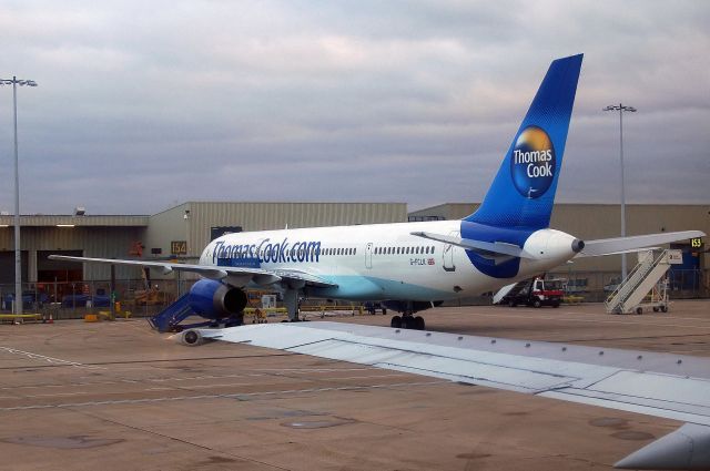 Boeing 757-200 (G-FCLK) - Thomas Cook B757-2Y0 (G-FCLK)  Photo taken after landing at LGW from NCL taxiing to LGW North Terminal on board British Airways B737-436SF (G-GBTA). (Photo Feb 2005)