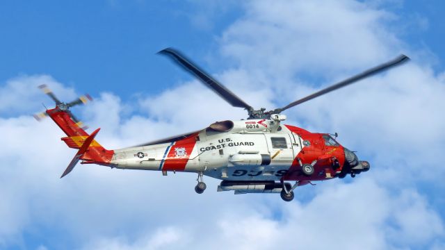 — — - US Coast Guard MH-60T approaches the HAL cruiseship MS Maasdamt at full sea for a medical emergency evacuation. March 25th 2015.