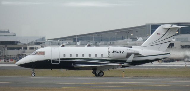 Canadair Challenger (N611AZ) - Taxiing for departure is this 2005 Bombardier Canadair Challenger 604 in the Winter of 2023.