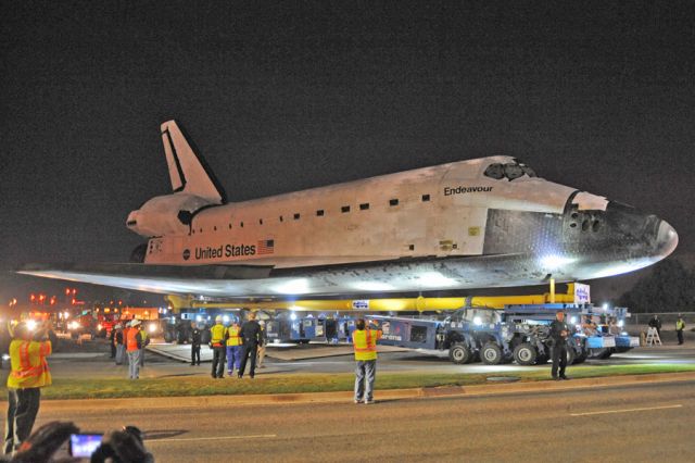 — — - Shuttle Endeavour departing LAX and heading for it's final home.