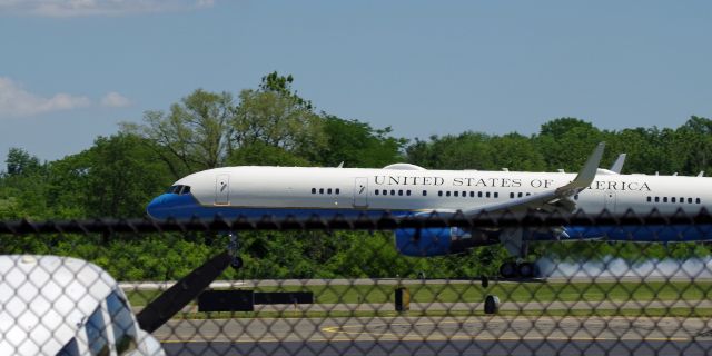 Boeing 757-200 (09-0015) - MORRISTOWN, NEW JERSEY, USA-JUNE 14, 2020: A United States Air Force jet, registration number 90015, is seen as it touches down on runway 5. In a few hours it will become Air Force One as it flies President Donald Trump back to Washington, D.C. after a weekend in New Jersey. When flying into or out of Morristown Airport, the Air Force uses the Boeing 757-200 as Air Force One, instead of the larger 747, because of shorter runways at Morristown.