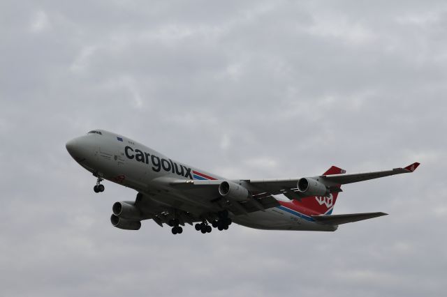 Boeing 747-400 (LX-OCV) - Massive Queen of the Skies, "City of Niederanven" thunders over the parking lot at Million Air Indy