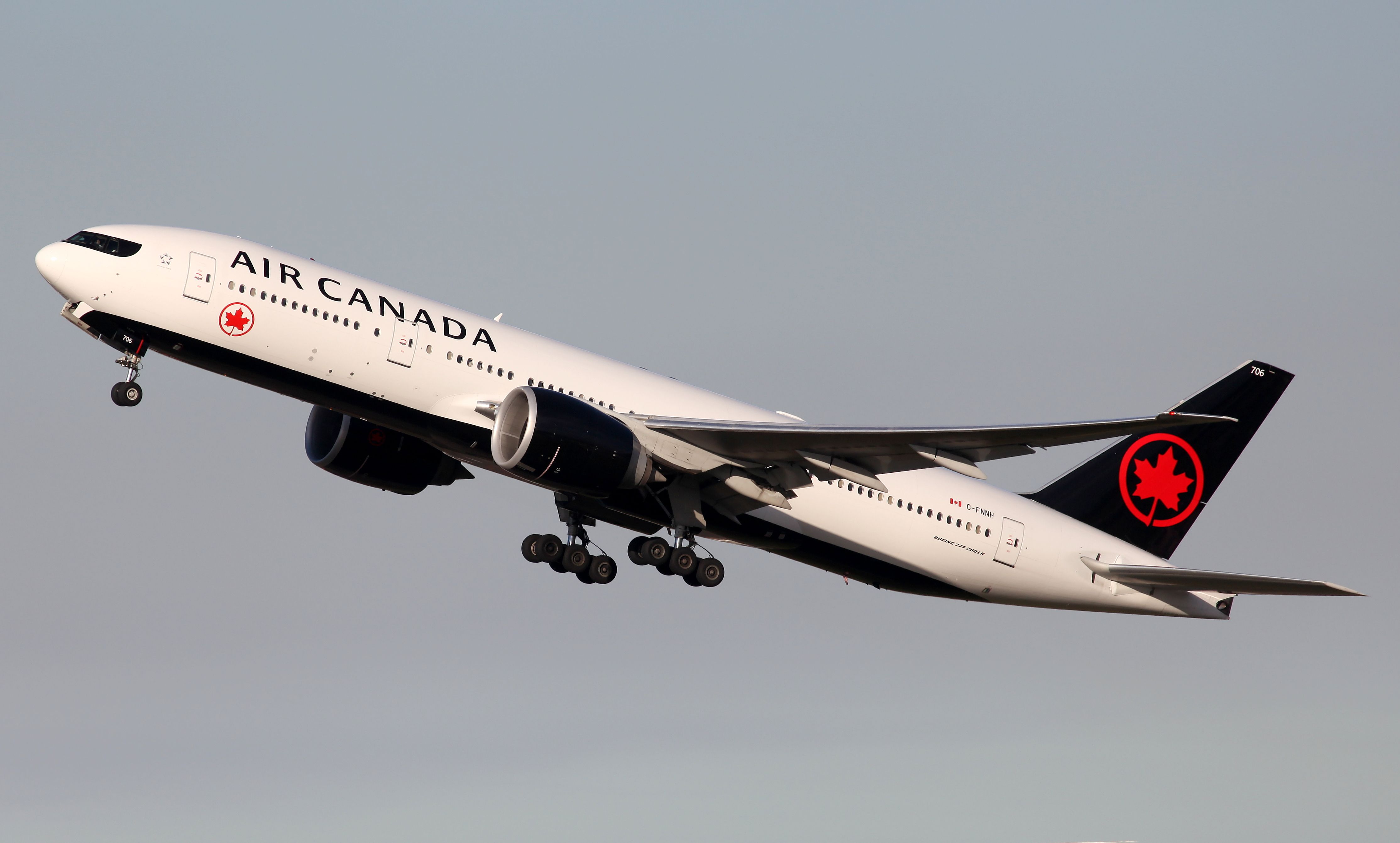 BOEING 777-200LR (C-FNNH) - Climbing From Rwy 34L