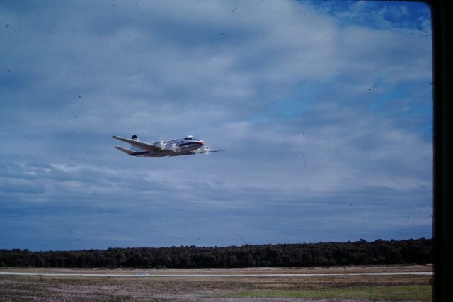 Hawker Siddeley Heron (VH-CLW) - Heron VH-CLW of Executive Airlines departing RWY05, circa 1978