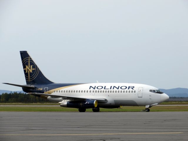 Boeing 737-200 (NRL550) - C-GTUK, A Nolinor 737-200 waiting for VIPs from the mining industry on the ramp in Sept-Îles (CYZV), Québec - September 2012