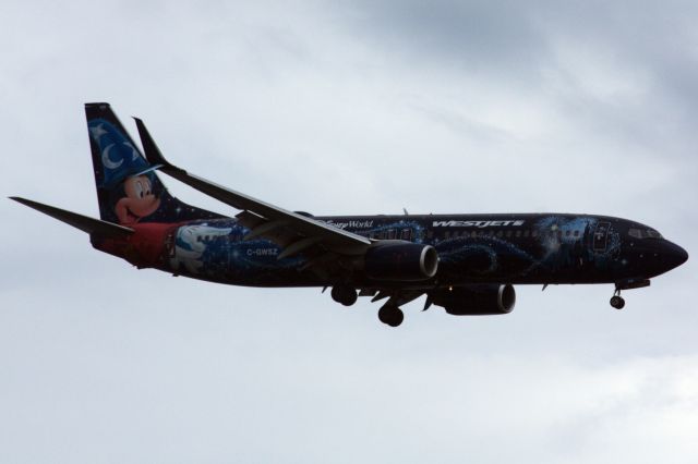 Boeing 737-800 (C-GWSZ) - WestJet B738 in special 'Walt Disney World - Mickey Mouse Livery' arriving to BOS from Calgary on 8/9/22.