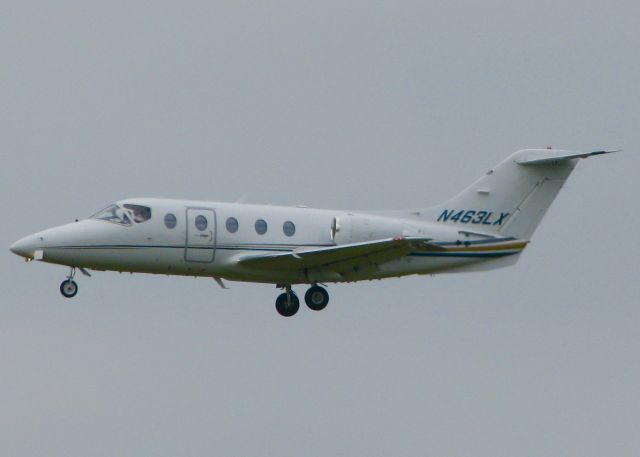 Beechcraft Beechjet (N463LX) - At Shreveport Regional. Landing in the rain.