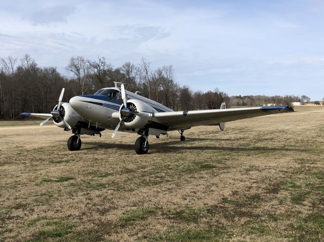 Beechcraft 18 (N62CJ) - Departing the Chilly Chili Fly-In