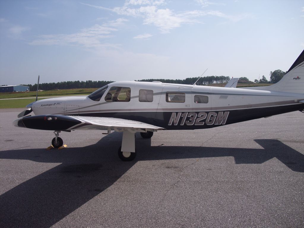 Piper Saratoga (N132GM) - Visiting the FBO ramp at KCCO