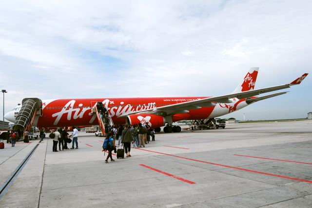 Airbus A330-300 (9M-XXB) - Boarding passengers the old fashioned way from Kuala Lumpur's Low Cost Carrier Terminal in preparation for departure to Kathmandu, Nepal. 21st Dec., 2013