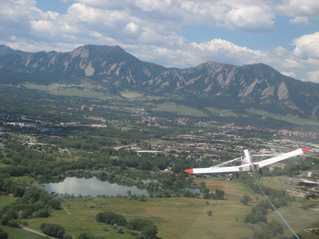 Piper PA-25 Pawnee — - Boulder from the point of view of a glider.