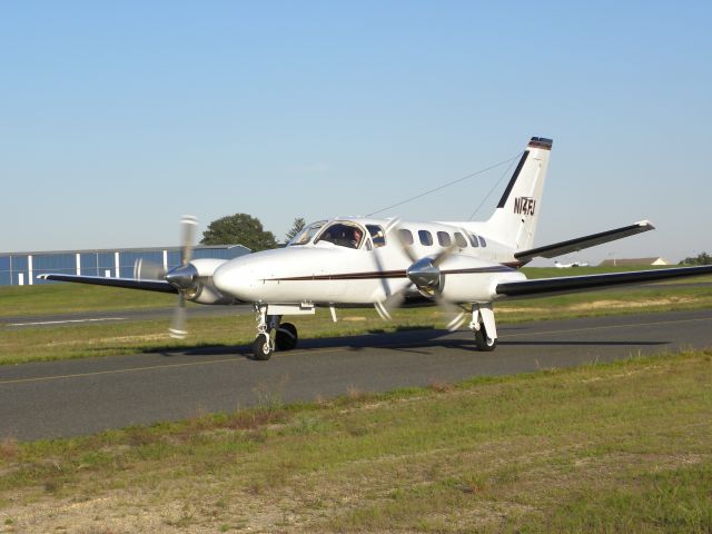 Cessna Conquest 2 (N14FJ) - N14FJ taxiing to 14 at BLM for departure.