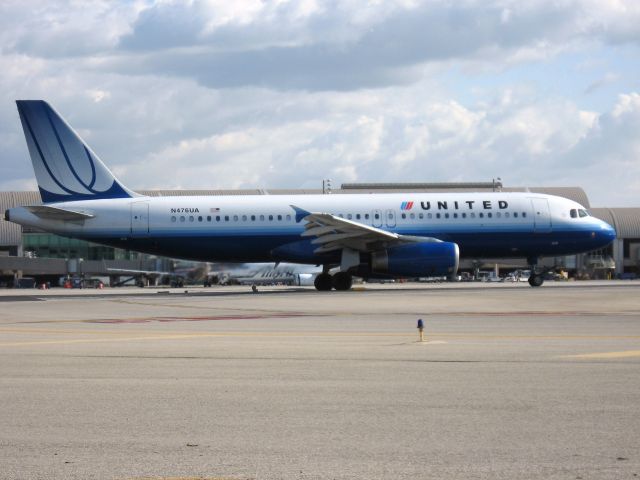 Airbus A320 (N476UA) - Holding on RWY 19R