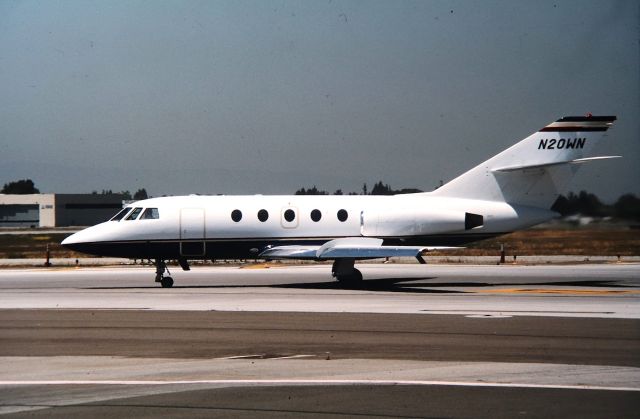 Dassault Falcon 20 (N20WN) - KSJC - Daussault Falcon 20 at San Jose headed to Runway 30L for departure - photo date apprx June 2000