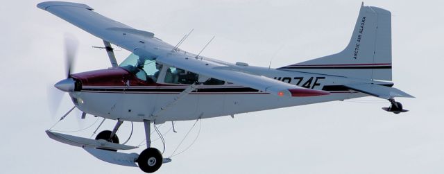 — — - Cessna  185 on skis.