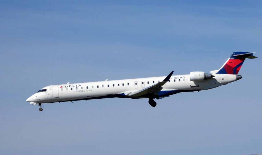 Canadair Regional Jet CRJ-900 (N303PQ) - On final is this Delta Connection Bombardier CRJ-900LP in the Autumn of 2018.