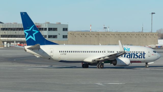 Boeing 737-800 (C-FTVF) - Transat 550 leaving Montreal for Varadero, Cuba back in February.