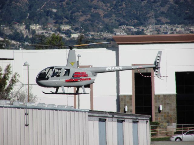 Robinson R-44 (N543BB) - Lifting off from Brackett Field