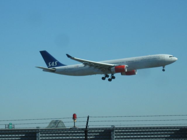 Airbus A330-300 — - Sitting in my truck waiting to be loaded.