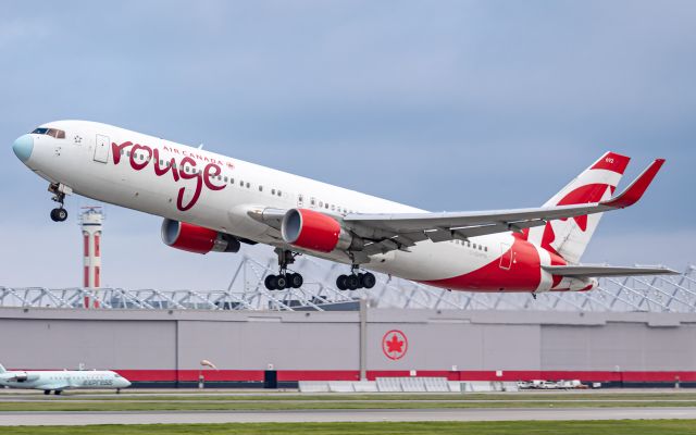 BOEING 767-300 (C-GHPN) - Air Canada Rouge 1589 departs for Edmonton. Sad to see these 767s being retired.