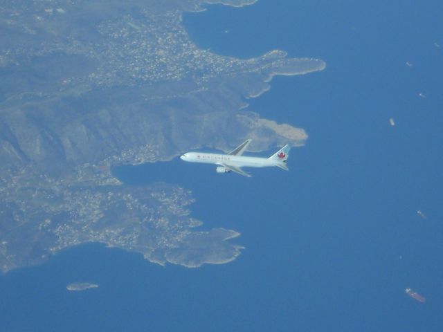 — — - Air Canada B767 northbound off the west coast of Italy from cockpit of FEDEX A310-200 from Tel Aviv to Munich