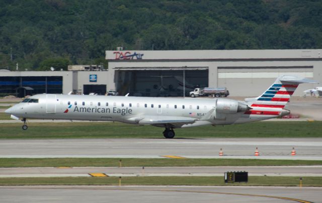 Canadair Regional Jet CRJ-700 (N543EA) - American Eagle (Envoy Air) 4136 is rotating Runway 32L for Chicago O'Hare at 4:03 PM.  Photo taken August 6, 2019 with Nikon D3200 at 300mm.