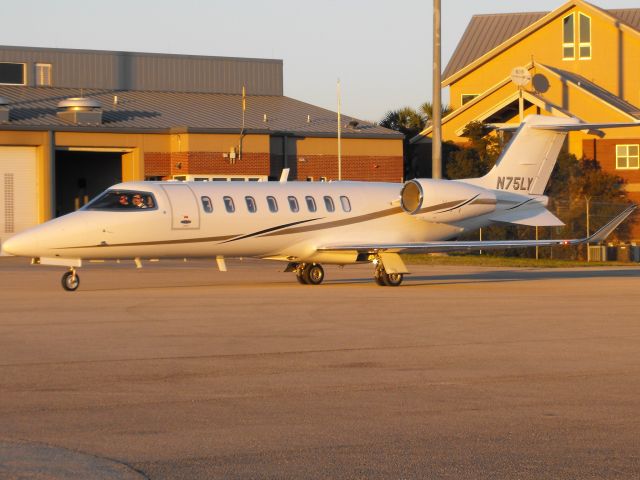 Bombardier Learjet 75 (SJJ75) - Lear Jet 75 taxiing out at dusk in Tallahassee