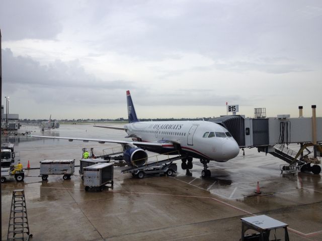 Airbus A319 (N764US) - A US Airways Airbus a319 at New Orleans International Airport (KMSY) on July 18, 2014. N764US was getting ready to depart to Charlotte Douglas International Airport (KCLT).