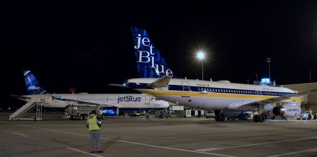 Airbus A320 (N763JB) - At ten minutes before straight-up midnight, JBUs N763JB ("Whats Old Is Blue Again"), the A320 recently repainted in the "New York International" special heritage livery scheme, is seen here at Reno Tahoe Internationals Gate B6 just before being pushed back for the return leg of a KJFK-KRNO-KJFK roundtrip run.  Last nights visit was the first time that jetBlues retro scheme has been to Reno since the new paint was unveiled a few weeks ago. It was well worth making the 40 minute late evening drive to go to KRNO right after watching Sunday Night football in order to get some captures of this outstanding new livery.