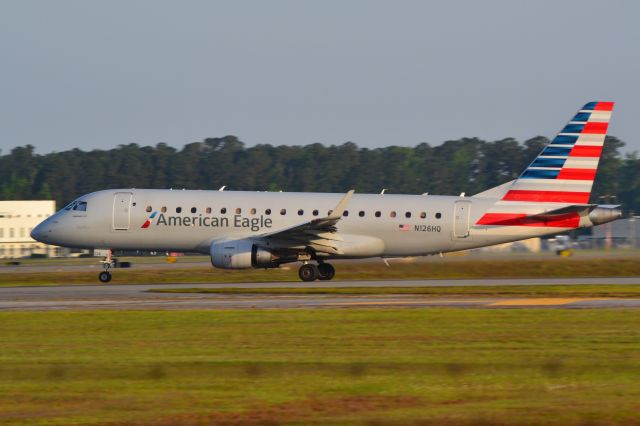 Embraer 175 (N126HQ) - Departing runway 24 at KILM for KCLT - 4/27/21