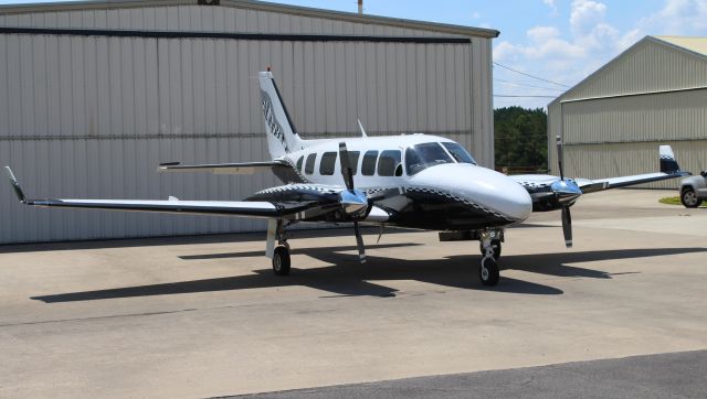 Piper Navajo (N74CE) - A Piper Navajo Chieftain outside its hanger at Guntersville Municipal Airport, AL - August 25, 2016