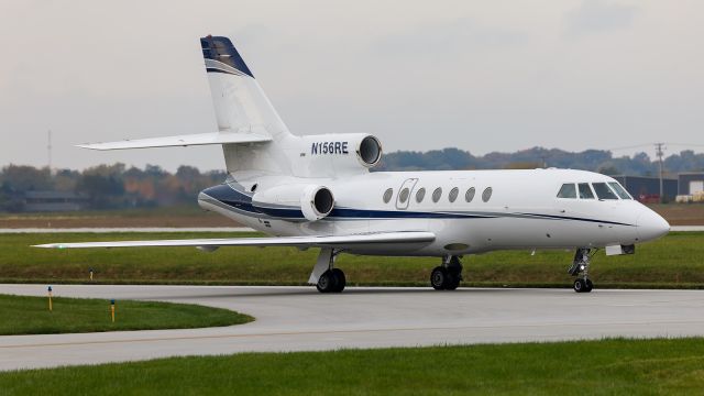Dassault Falcon 50 (N156RE) - A Dassault Falcon 50 gets ready to turn off the taxi way and head towards the FBO at KVPZ.
