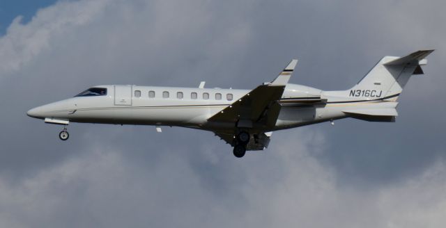 Learjet 45 (N316CJ) - About to touch down is this 2008 Learjet 45 in the Autumn of 2024.