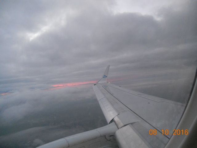 Embraer ERJ 175 — - ...toward landing in Amsterdam on a cloudy morning