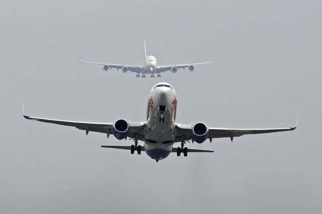 Boeing 737-800 (G-JZHF) - EXS933 departing for Salzburg with EK17, A6-EEY next to land on 23R