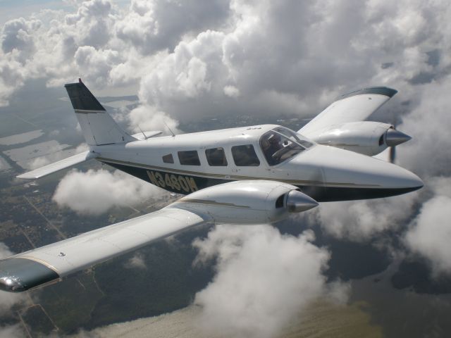 Piper Seneca (N3460M) - 1987 Seneca II completely reworked with both Turbo 200 hp engines replaced in 08. The interior is completely refinished with leather as well as a new paint job completed 01/01/09 (in-flight photo reflects old paint). The avionics were completely upgraded in 07 to include Garmin 430 and a 530 with Mode S Traffic, XM weather and music. A DVD player integrated to the intercom was installed for the enjoyment and comfort of the passengers.