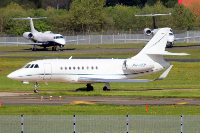 Dassault Falcon 2000 (PH-CFR) - Lining up to depart rwy 24 on 10-May-23 operating a round trip to LIML.