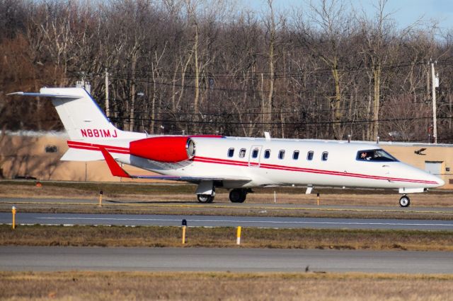 Learjet 45 (N881MJ) - Learjet 45 owned by FiveGuys Enterprises taxiing to Ruwnay 32 at the Buffalo Niagara International Airport for Clevelandbr /br /** First Photos of N881MJ on FlightAware **