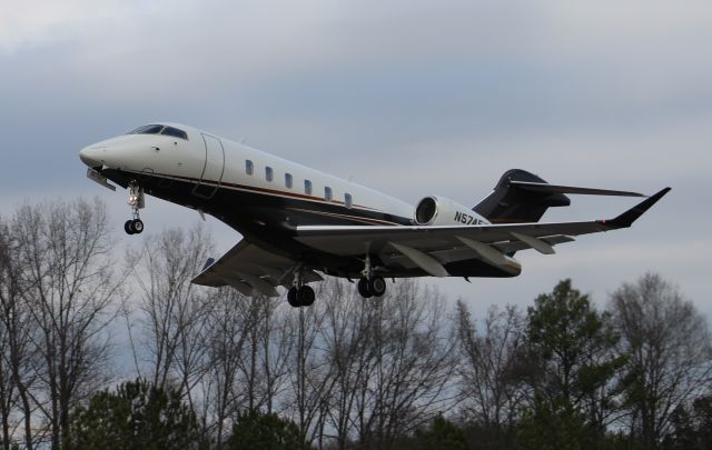 Bombardier Challenger 300 (N574FX) - A Bombardier Challenger CL300 departing Runway 22 at Word Field, Scottsboro Municipal Airport, AL - January 25, 2017.