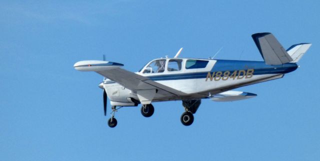 Beechcraft 35 Bonanza (N884DB) - About to touch down is this 1949 Beech A35 Bonanza in the Winter of 2025.