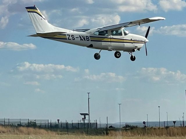 Cessna Centurion (ZS-AVB) - Landing runway 29 with non-standard right hand circuit (Johannesburg International airport in the vicinity). 16-MAR-2024.