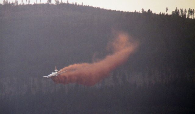 — — - I shot this from about 4 miles away at sunset but due to the smoke you would not even have known the sun was still up 