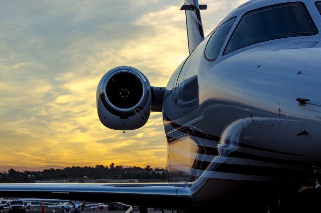 — — - Beechcraft Premier 1 at KCRQ at sunrise.