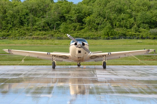 TEMCO Swift (N21FA) - A 1950 Globe Swift sitting on the wet ramp at Butler Co. Regional Airport.