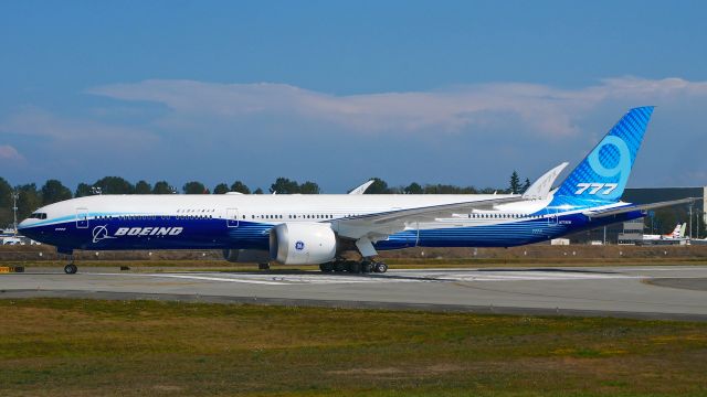 BOEING 777-9 (N779XW) - BOE001 taxis from Rwy 34L to the Boeing North ramp during taxi tests on 8.7.19.  (ln 1567 / cn 64240).