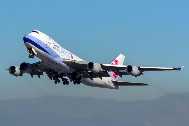 Boeing 747-400 (B-18723) - Mid afternoon departure from Rwy 25L, shot from Imperial Hill.