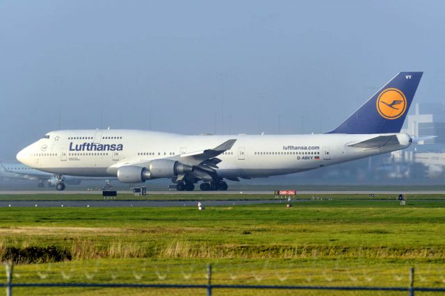 Boeing 747-400 (D-ABVY) - Coming out of thick fog