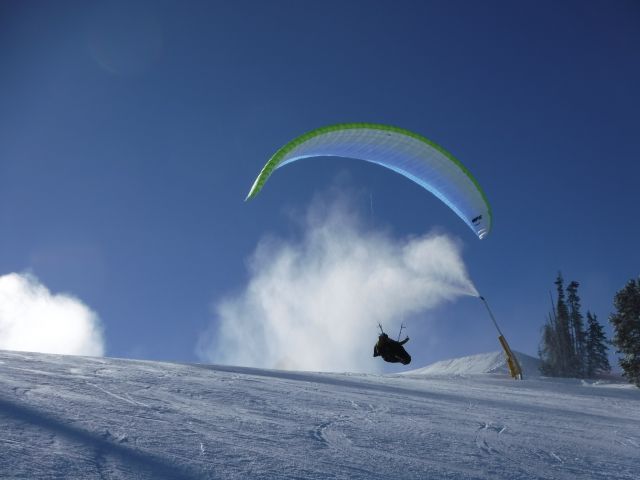 — — - Para Glider taking off from the top of Baldy ski hill in Sun Valley, Idaho